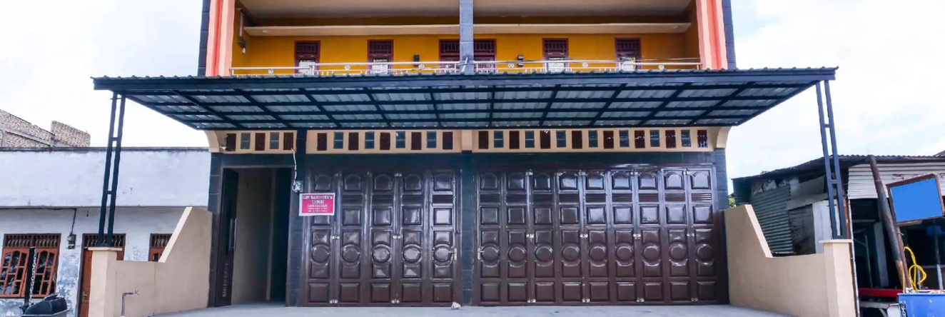 OYO 91223 Mutiara Guest House, 多洛克桑古尔 — 照片 1