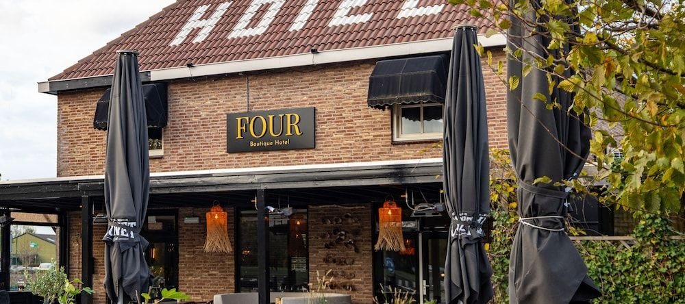 Boutique Hotel Four, Гелдроп — фото 1