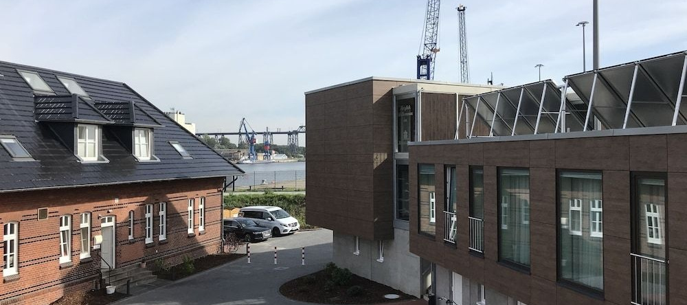 Kanal-Haus Das Gästehaus direkt am NOK, 奥斯特伦费尔德 — 照片 1