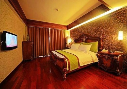Xing Long Old Ban Yan Resort & Spa, Ваньнин — фото 1