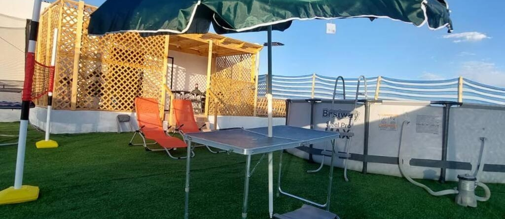 Cabaña con piscina, vista al Oasís de Pica., 皮卡 — 照片 1