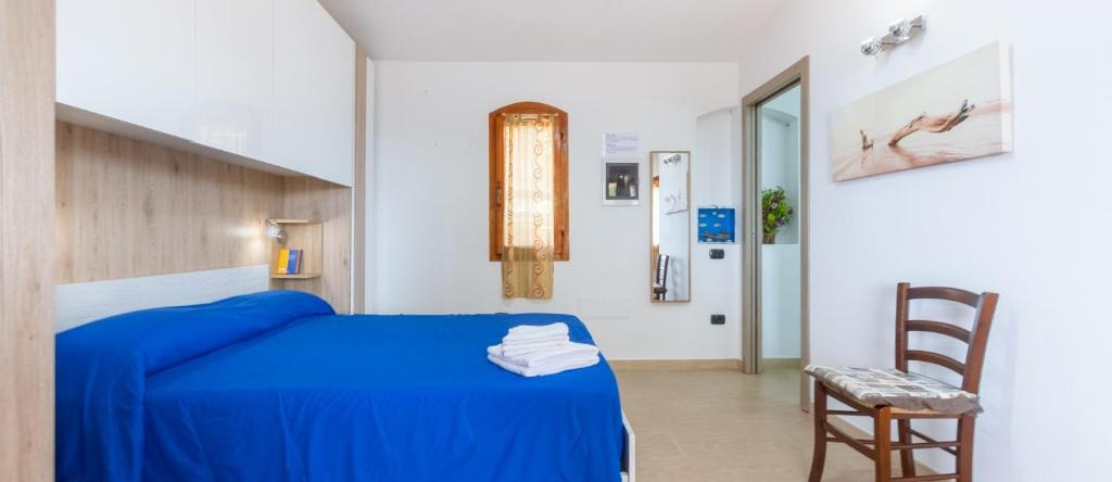 Apartments Casa Vacanze Porto Pino, 圣安娜阿雷西 — 照片 1