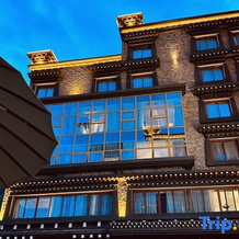 Huajing Wenlan Hotel, 稻城 — 照片 4