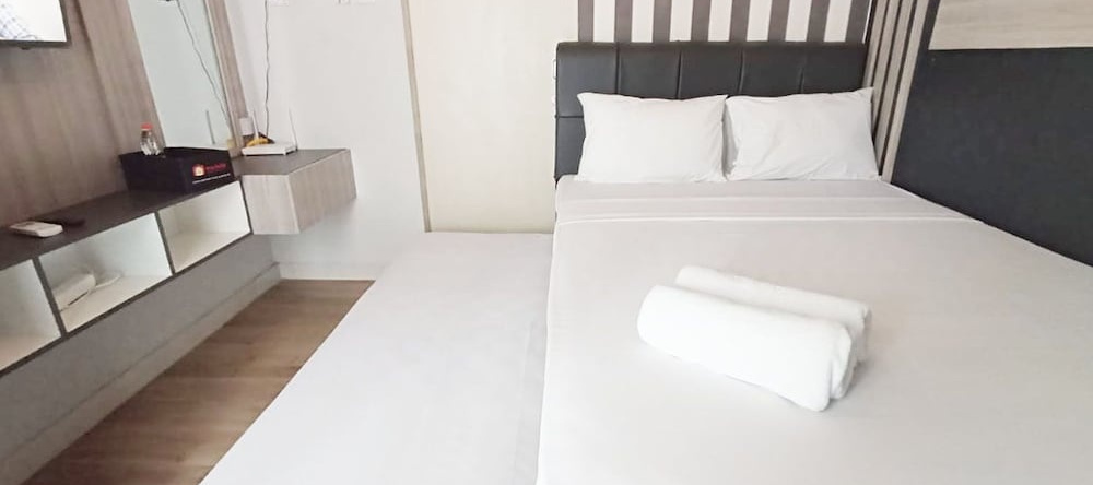 Homey And Cozy Living Studio Amartha View Apartment, 三宝垄 — 照片 1