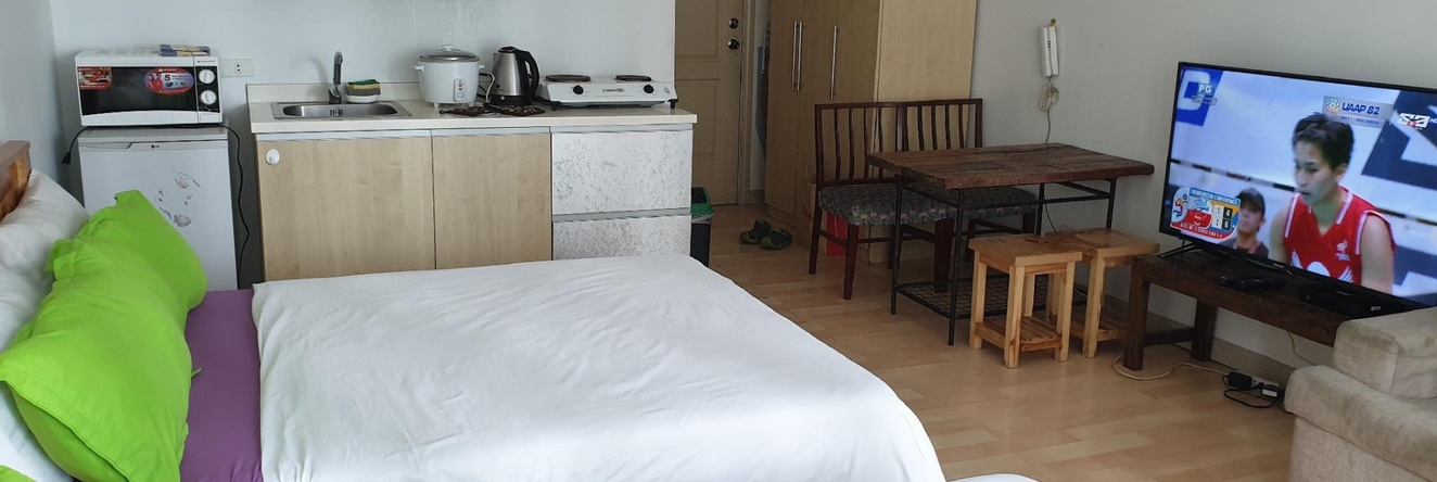 Studio Staycation w/ 2 queen across Shangrila Mall, 曼达卢永 — 照片 1