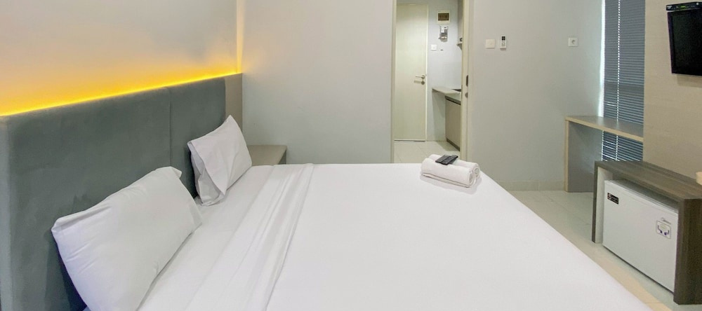 Comfortable 1Br Without Living Room At Amartha View Apartment, 三宝垄 — 照片 1