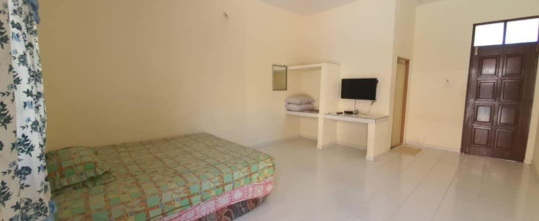 Spot On 90242 Sri Pantai Resort, Бачок — фото 1