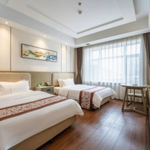 Delin Business Hotel, Цзиси — фото 5