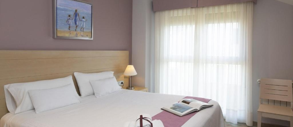 Apartamentos Turísticos Playa de Tapia, 塔皮亚德卡萨列戈 — 照片 1