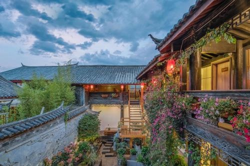 Lijiang Shiheyuan Jingyi Hotel, Лицзян — фото 1