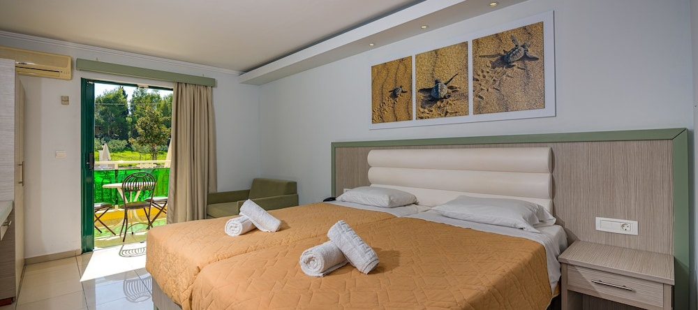 Caretta Beach Holiday Village, Kalamaki — photo 1