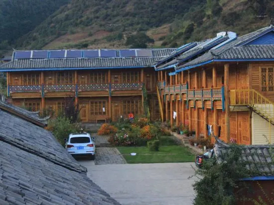 Lugu Lake Hualou Hotel, 吴芝楼 — 照片 1