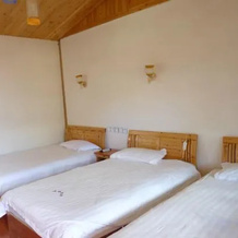 Lugu Lake Hualou Hotel, 吴芝楼 — 照片 2