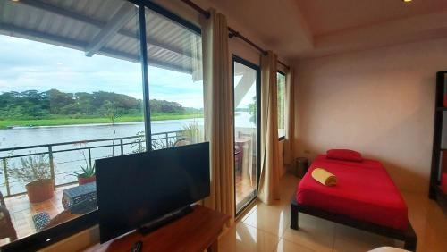 Tortuguero Adventures GuestHouse, 托尔图格罗 — 照片 1