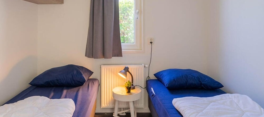Comfy Chalet with Dishwasher near Beach, 比丁赫伊曾 — 照片 1