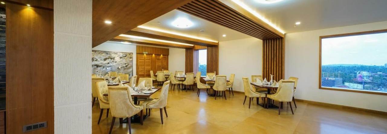 Kpm Tripenta Hotel, Кожикоде — фото 1