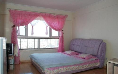 Mudanjiang Aizhilv Apartment, 牡丹江 — 照片 1